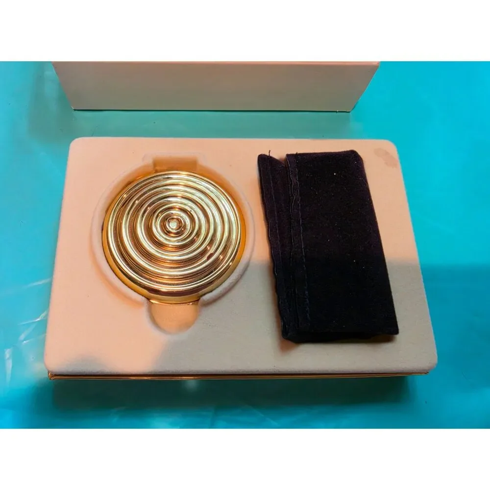 1990's Estee Lauder Lucidity Swirl of Gold 